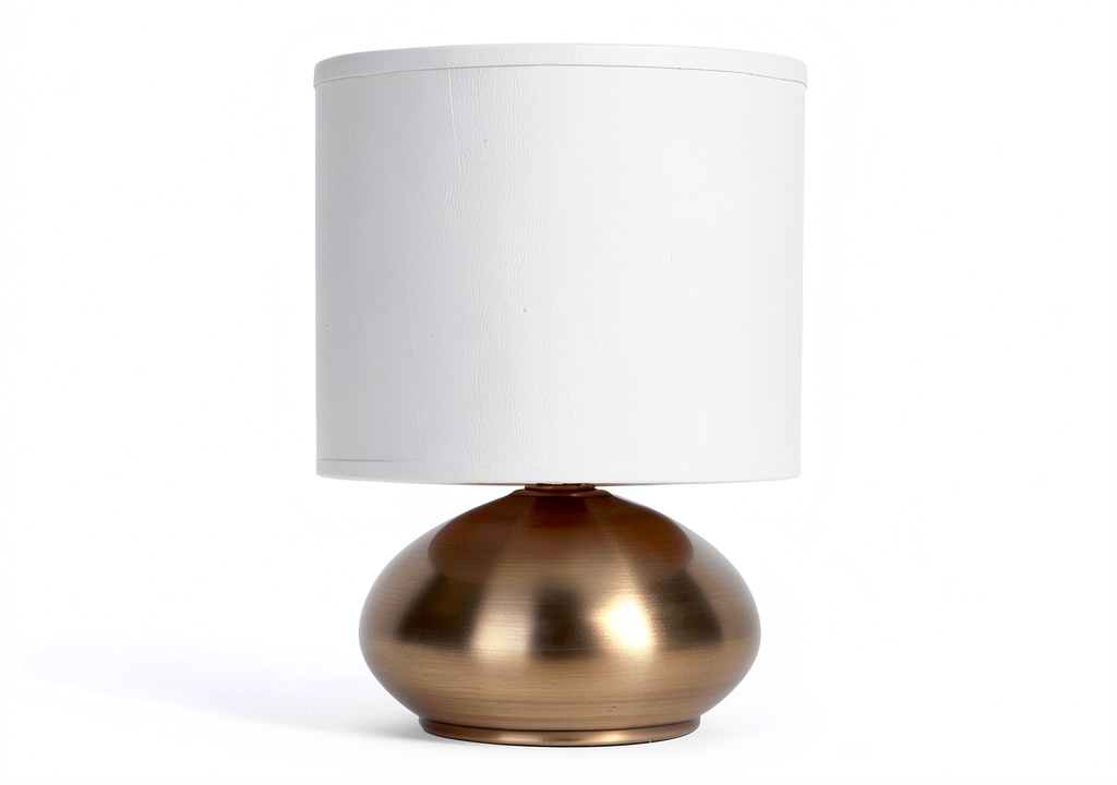 Catalina Lighting antique brass touch table lamps on a bedside table